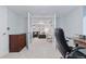 View of basement into entertainment space featuring built-ins, stylish decor, and a comfortable layout at 4094 Bimini Ct, Boulder, CO 80301