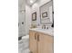 Well-lit bathroom featuring modern fixtures, stylish vanity, and a glass-enclosed shower with tiled walls at 4094 Bimini Ct, Boulder, CO 80301