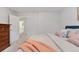 Comfortable bedroom with neutral walls, soft carpet, and an ensuite bathroom entrance at 4094 Bimini Ct, Boulder, CO 80301