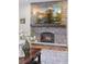 Cozy fireplace with a stone surround and hearth, creating a warm and inviting atmosphere at 4094 Bimini Ct, Boulder, CO 80301
