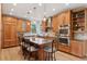 Modern kitchen with stainless steel appliances, a central island, and custom wood cabinets at 4094 Bimini Ct, Boulder, CO 80301