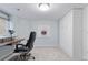 Comfortable office space featuring a built in murphy bed, ample natural light, and a functional workspace at 4094 Bimini Ct, Boulder, CO 80301