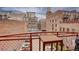 View from the balcony featuring a table, overlooking the city buildings at 1435 Wazee St # 408, Denver, CO 80202