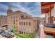 Balcony with BBQ, table, and railing with city views at 1435 Wazee St # 408, Denver, CO 80202