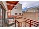 Comfortable balcony with chair, table, and city views providing a relaxing outdoor space at 1435 Wazee St # 408, Denver, CO 80202