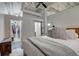 Bright bedroom with exposed ceiling and a convenient walk-in closet. Barn door visible at 1435 Wazee St # 408, Denver, CO 80202
