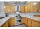 Stylish kitchen showcasing granite countertops, stainless steel appliances, and light wood cabinetry, a modern design at 1435 Wazee St # 408, Denver, CO 80202