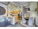 Modern kitchen featuring stainless steel appliances, light wood cabinetry, and a center island with bar seating at 1435 Wazee St # 408, Denver, CO 80202