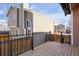 Back deck with a view of the house and yard at 670 W Jamison Cir, Littleton, CO 80120