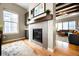 Modern fireplace with a clean design and a view into the living area at 18722 W 87Th Ave, Arvada, CO 80007