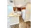 Well-equipped kitchen featuring modern appliances and convenient washer and dryer at 64 Nome Way # C, Aurora, CO 80012