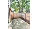 Back patio area featuring a wood fence and some shade at 64 Nome Way # C, Aurora, CO 80012