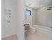 Modern bathroom featuring stylish fixtures, a soaking tub, and sleek design at 1626 S Sherman St, Denver, CO 80210