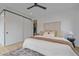 Comfortable bedroom with a plush bed, modern decor, and plenty of natural light at 1626 S Sherman St, Denver, CO 80210