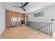 Modern kitchen featuring stainless steel appliances, sleek cabinetry, and hardwood floors at 1626 S Sherman St, Denver, CO 80210