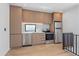 Modern kitchen with stainless steel appliances and bright natural light at 1626 S Sherman St, Denver, CO 80210