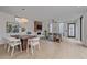 Modern living space featuring a fireplace, dining table and stylish furniture with minimalist design at 1626 S Sherman St, Denver, CO 80210