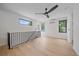 Open-concept living area featuring hardwood floors, natural light, and modern fixtures at 1626 S Sherman St, Denver, CO 80210