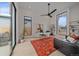 Stylish office featuring large windows, hardwood floors, and a comfortable seating area at 1626 S Sherman St, Denver, CO 80210