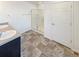 Bathroom features double sinks, modern shower with glass door and patterned tile flooring at 20028 E 62Nd Ave, Aurora, CO 80019