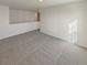 Loft living room with neutral carpet and lots of natural light at 20028 E 62Nd Ave, Aurora, CO 80019