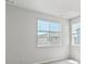 Bright bedroom with windows and neutral walls, offering a simple and clean aesthetic at 14135 Deertrack Ln, Parker, CO 80134