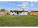 Expansive backyard showcasing lush green grass and potential for outdoor activities and relaxation at 7952 Zuni St, Denver, CO 80221