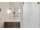 Updated bathroom with a marble countertop vanity and tiled glass shower at 1401 Delgany St # 202, Denver, CO 80202