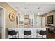 Modern kitchen with island, quartz countertop, and stainless steel appliances at 1401 Delgany St # 202, Denver, CO 80202