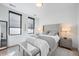 Bedroom with neutral decor, and large windows at 4214 E 8Th Pl, Denver, CO 80220