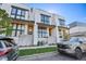 Contemporary home featuring modern design with large windows and an inviting entrance at 4214 E 8Th Pl, Denver, CO 80220