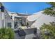 Relax on this stylish rooftop deck with comfortable seating and a shade sail, perfect for outdoor entertaining at 4214 E 8Th Pl, Denver, CO 80220