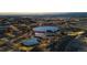 Aerial night view of Denver featuring the Ball Arena with surrounding buildings and transportation at 1438 Little Raven St # 104, Denver, CO 80202