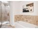 Bathroom showcasing marble tile detail and shower at 1438 Little Raven St # 104, Denver, CO 80202