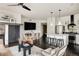 Spacious living room boasts modern furnishings, ceiling fan, and a sleek, open design at 1438 Little Raven St # 104, Denver, CO 80202