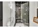 Elegant bathroom boasting a black marble shower and modern fixtures at 520 Columbine St, Denver, CO 80206