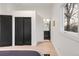 Bedroom featuring a bed and a view into the on-suite bathroom at 520 Columbine St, Denver, CO 80206