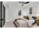 Modern bedroom featuring a ceiling fan, neutral walls, and comfortable decor at 520 Columbine St, Denver, CO 80206