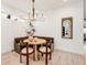 Cozy dining area with a round table and built-in banquette at 520 Columbine St, Denver, CO 80206