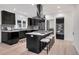 Open concept kitchen with large island, breakfast bar, and high-end appliances at 520 Columbine St, Denver, CO 80206