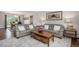 Comfortable living room featuring stylish furniture, hardwood floors, and ample natural light at 6150 S Southwood Dr, Centennial, CO 80121
