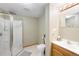 Bathroom featuring a glass-enclosed shower, toilet, and a wood vanity with sink at 19817 E Prentice Ave, Centennial, CO 80015