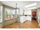 Modern kitchen featuring white cabinets, ample counter space, and bright natural light at 19817 E Prentice Ave, Centennial, CO 80015