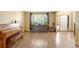 Bright living room with wood floors, a large window, and stylish decor at 19817 E Prentice Ave, Centennial, CO 80015