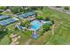 Experience leisure with a pool, tennis courts, and golf course in an aerial view at 41 Eagle Dr, Littleton, CO 80123