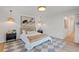 Clean and modern bedroom with a neutral palette, stylish light fixtures, and decor at 41 Eagle Dr, Littleton, CO 80123