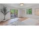 Light, bright bedroom with sliding glass door to deck and backyard at 41 Eagle Dr, Littleton, CO 80123