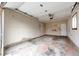 Spacious garage with ample room for parking and storage and an exterior door at 1945 Yosemite St, Denver, CO 80220