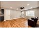 Bright and airy living room featuring hardwood floors, recessed lighting, and ample natural light at 1945 Yosemite St, Denver, CO 80220