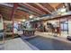 A large finished basement area with pool table, exercise equipment and ample space for activities at 7900 E Iowa Ave, Denver, CO 80231
